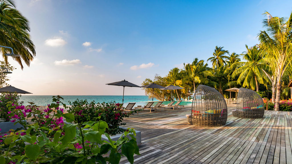Swimming Pool Deck - Fiyavalhu Resort Maldives